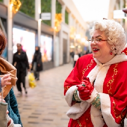 Singing Santa and Christmas Woman