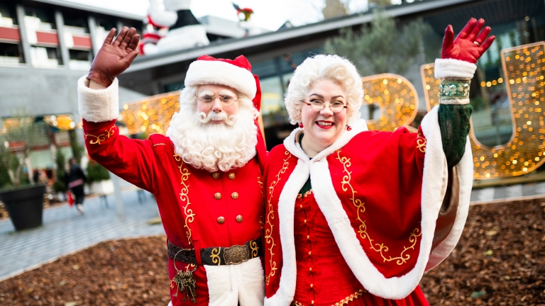 Singing Santa and Christmas Woman